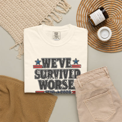 We’ve Survived Worse T-Shirt — 1776 → 2026 Patriotic Tee